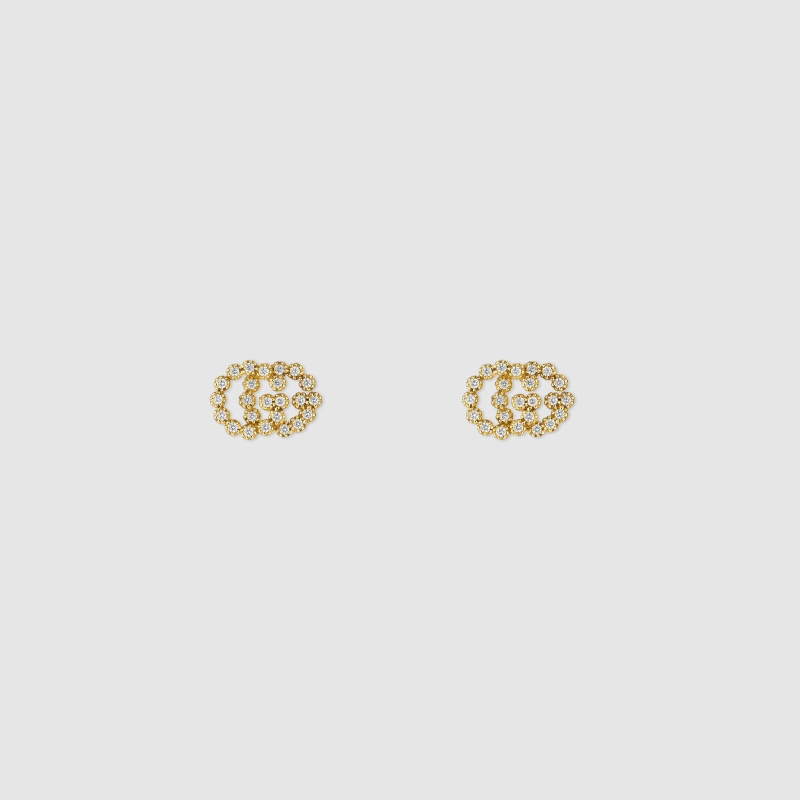 G*u*i earrings